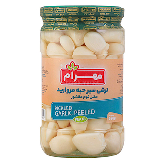 عکس ترشی سیر حبه مروارید 680 گرم مهرام